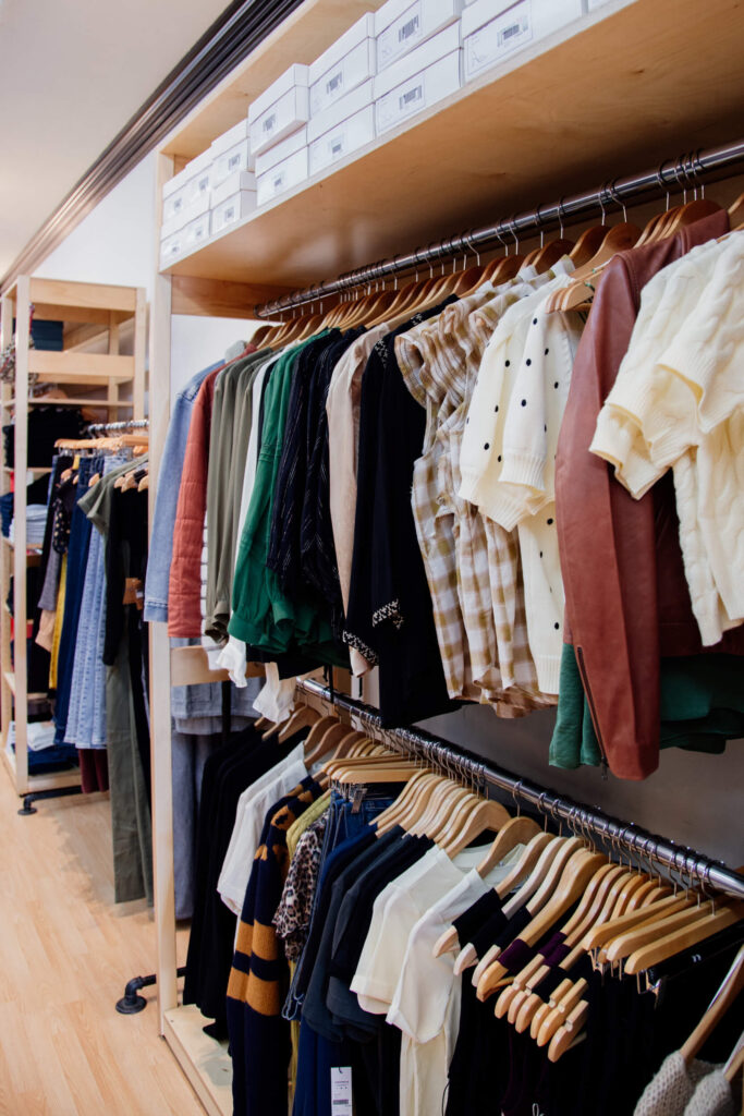 Shirts on racks in a shop in Victoria, BC.