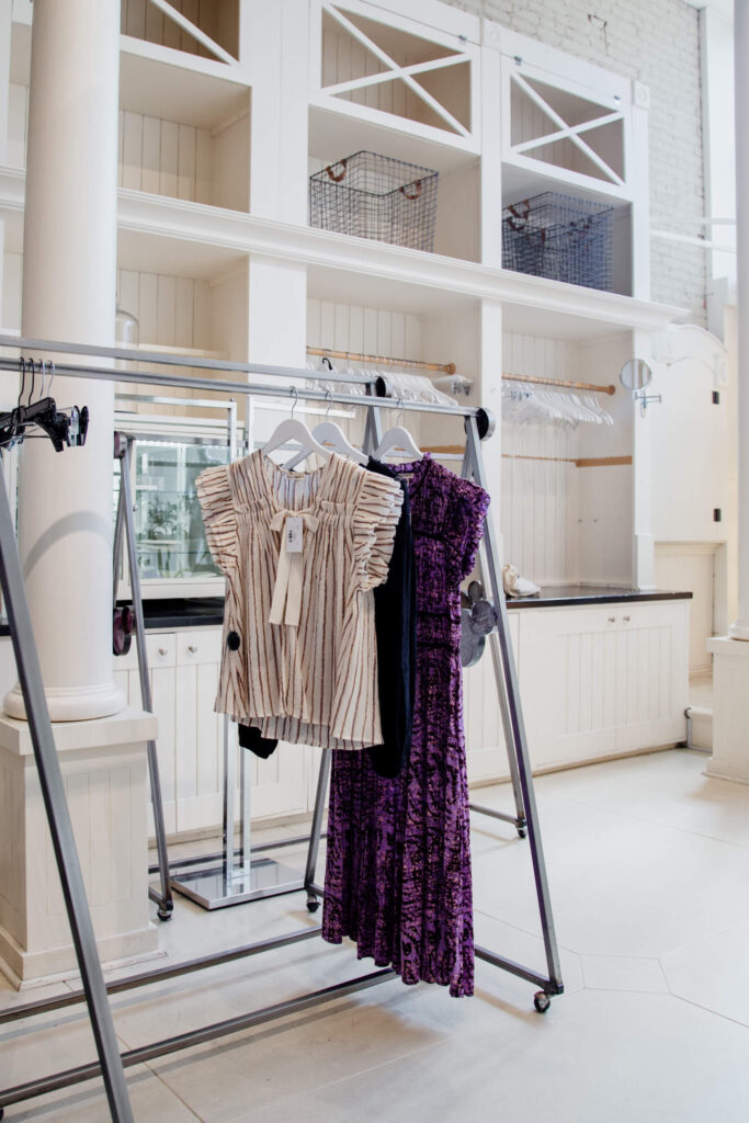 Two dresses on a rack in a shop in Victoria, BC.