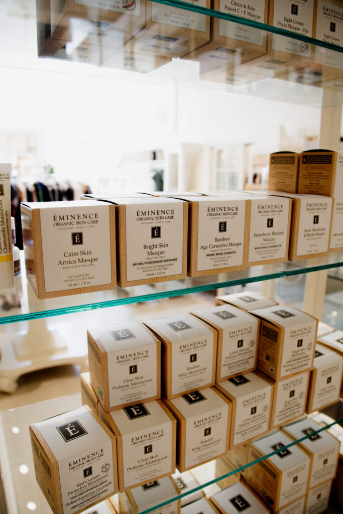 Beauty creams stacked on a shelf in a shop in Victoria, BC.