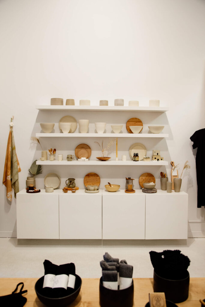 Ceramics displayed on a shelf.