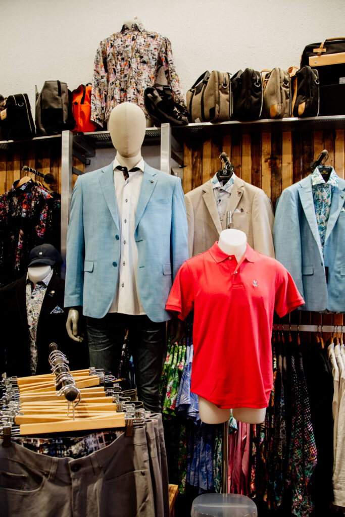 Jackets and shirts on display in a shop in Victoria, BC.