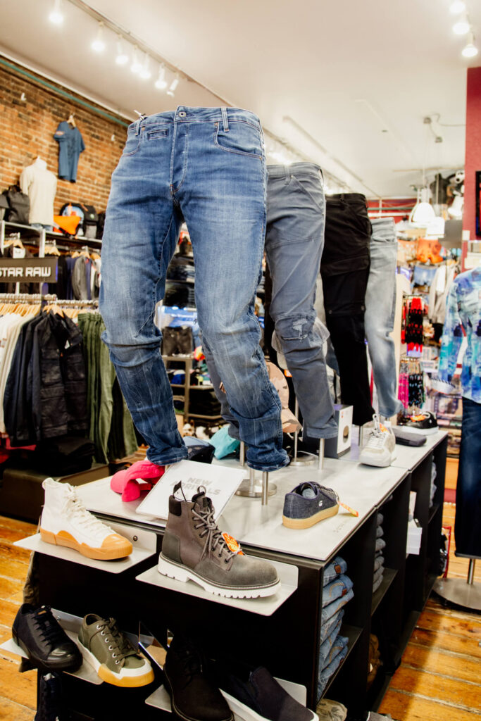 Jeans and boots on display in a fashion shop in Victoria, BC.