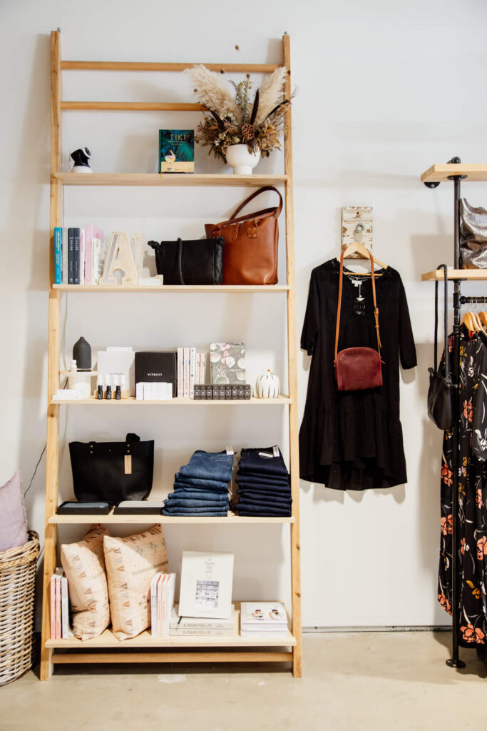 Dresses and bags for sale at a shop in Victoria, BC.