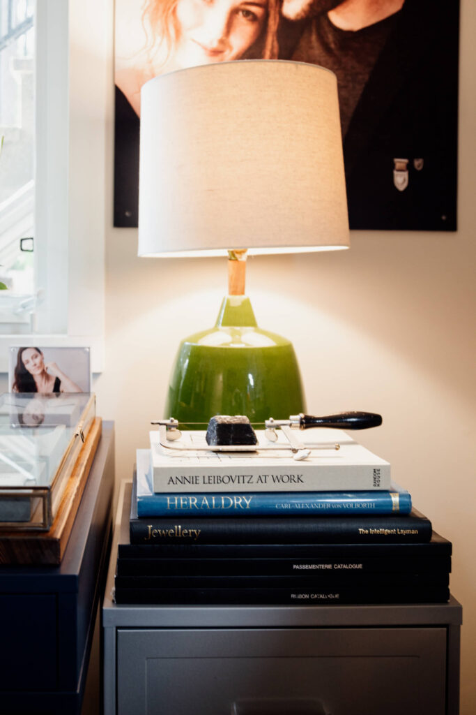 A stack of books in a jewellery studio.