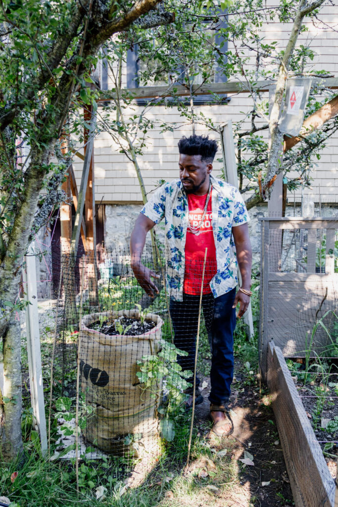 A man explains his burlap sack garden in Victoria, BC.